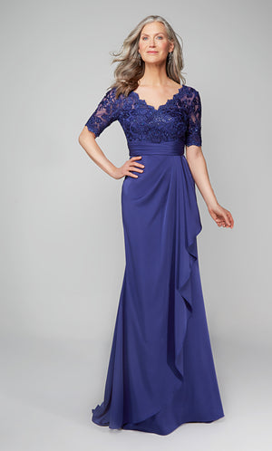 Long navy ruffle dress with a scalloped V neckline, faux belt at the natural waist, and short sleeves. Color-SWATCH_27595__NAVY
