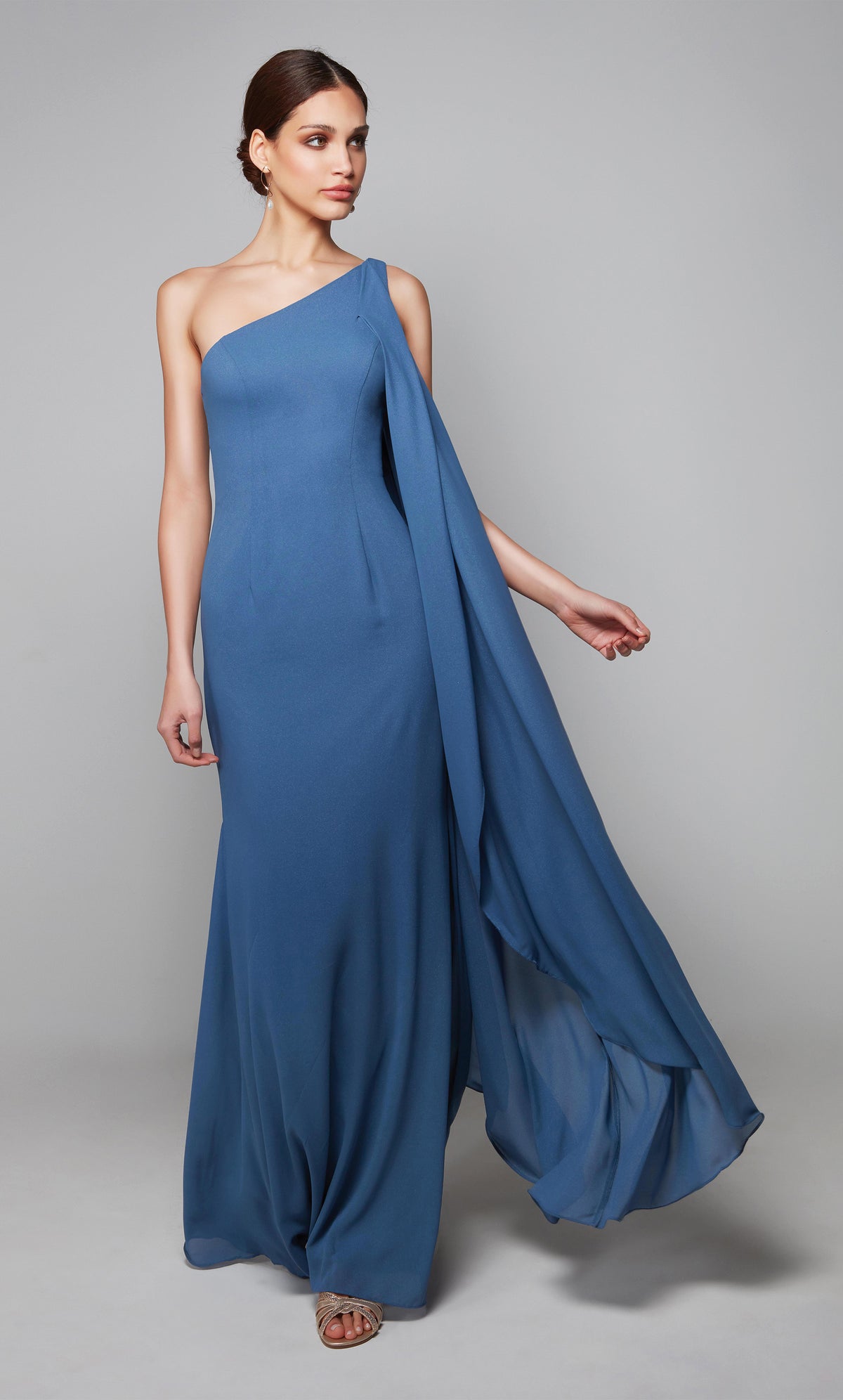 Blue one shoulder mother of the groom dress with a wrap hem cape.