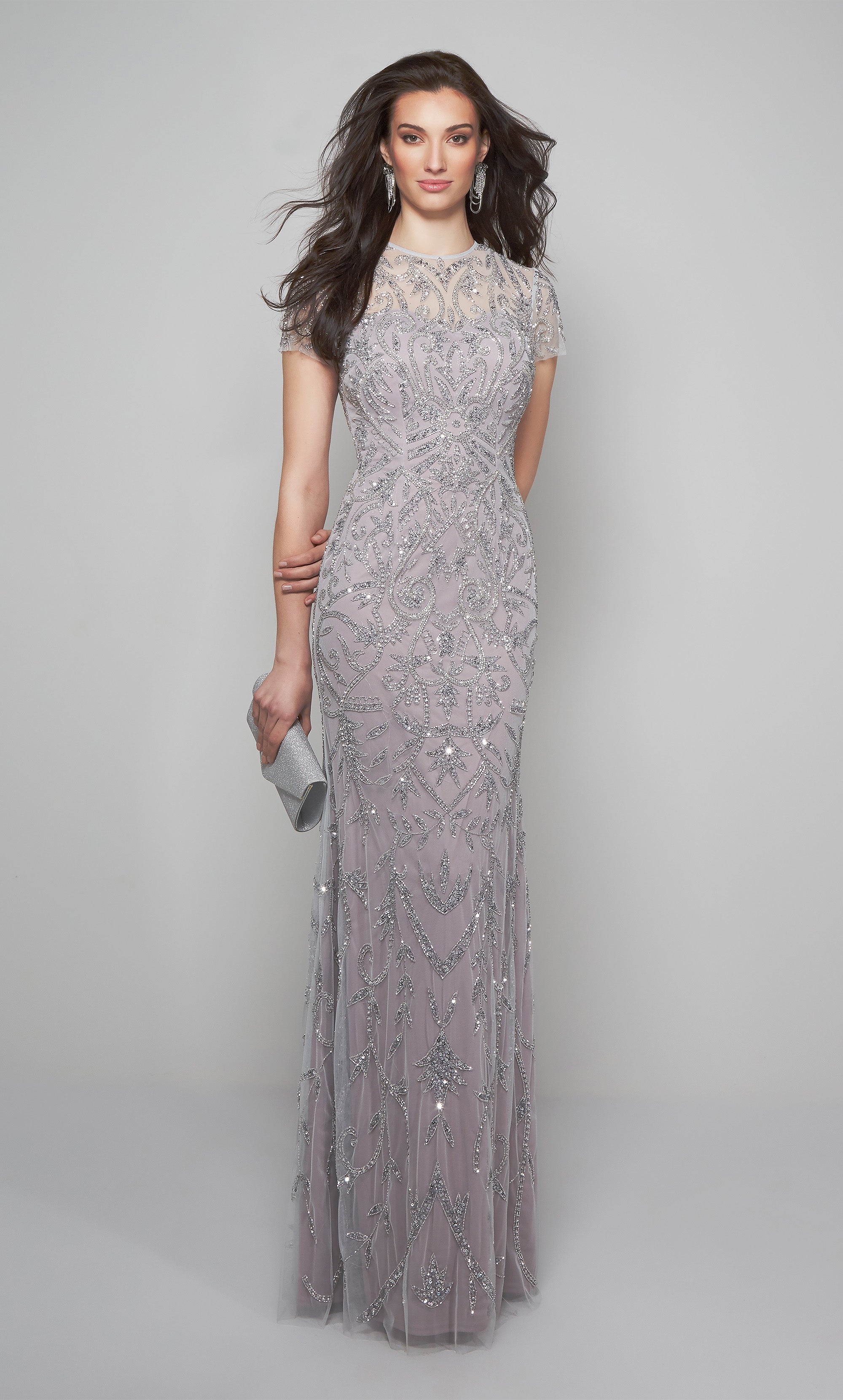 Fit and flare beaded formal dress with an illusion high neckline and short sleeves.