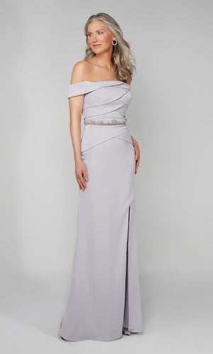 Silver off the shoulder evening gown with beaded waist and side slit.