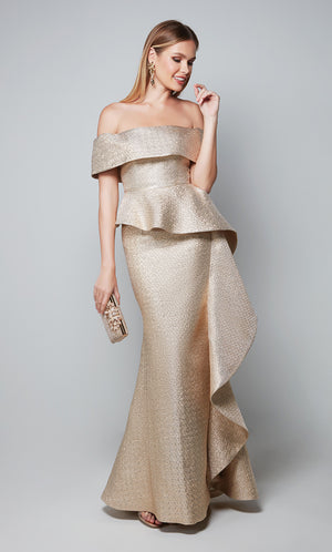 Elegant gold evening gown with an off the shoulder neckline, peplum top, and side ruffle.