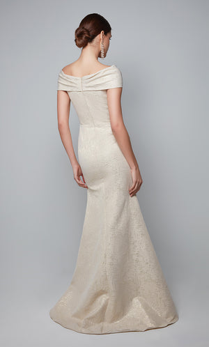 Champagne-gold formal dress with a closed back and fit and flare silhouette.
