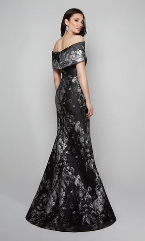 Fit and flare formal evening gown with an off the shoulder neckline in black-silver.