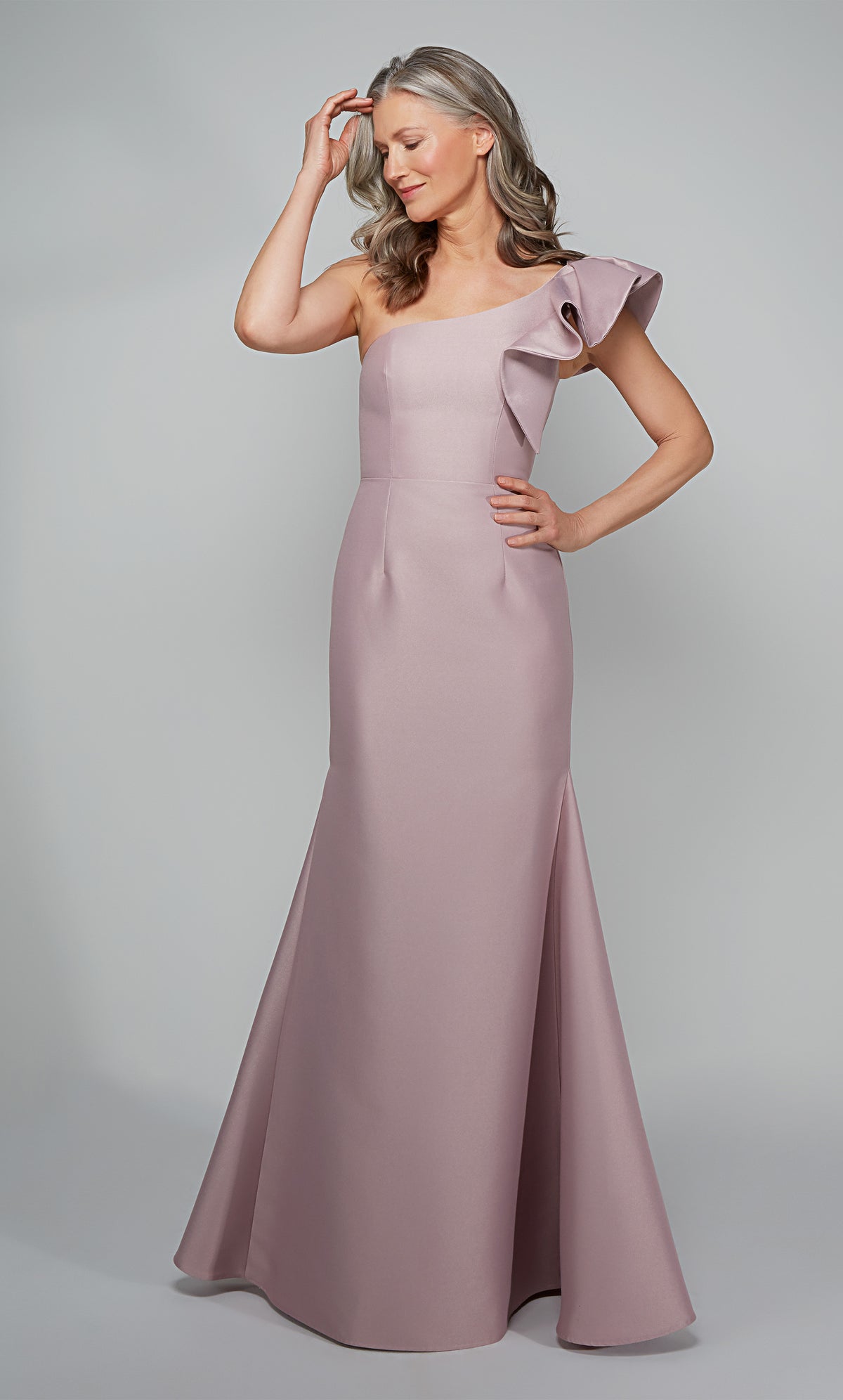 Fit and flare one shoulder ruffle dress in pink.