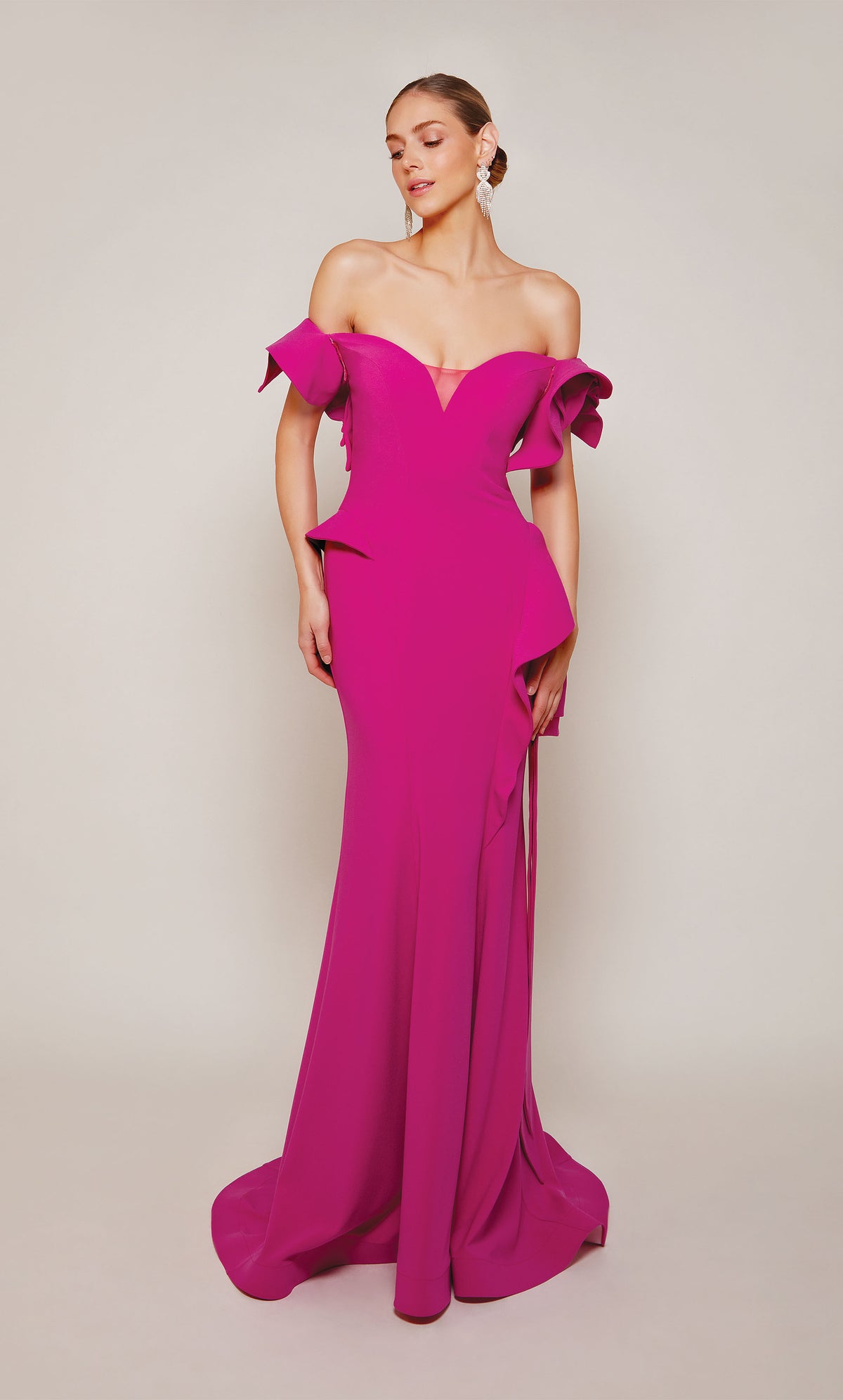 A chic, raspberry pink wedding guest dress boasting an off-the-shoulder neckline, rosette sleeves, and a sheath skirt with cascading ruffles. An excellent choice for a formal evening wedding.