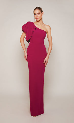 A sophisticated one-shoulder wedding guest dress with a gorgeous ruffle on the right shoulder and a fitted silhouette in a vibrant sparkling grape color. This ALYCE Paris designer gown is perfect for a formal evening wedding or black tie event.