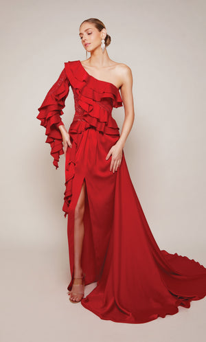 A one shoulder ruffle dress with a front slit and dramatic train in red satin.