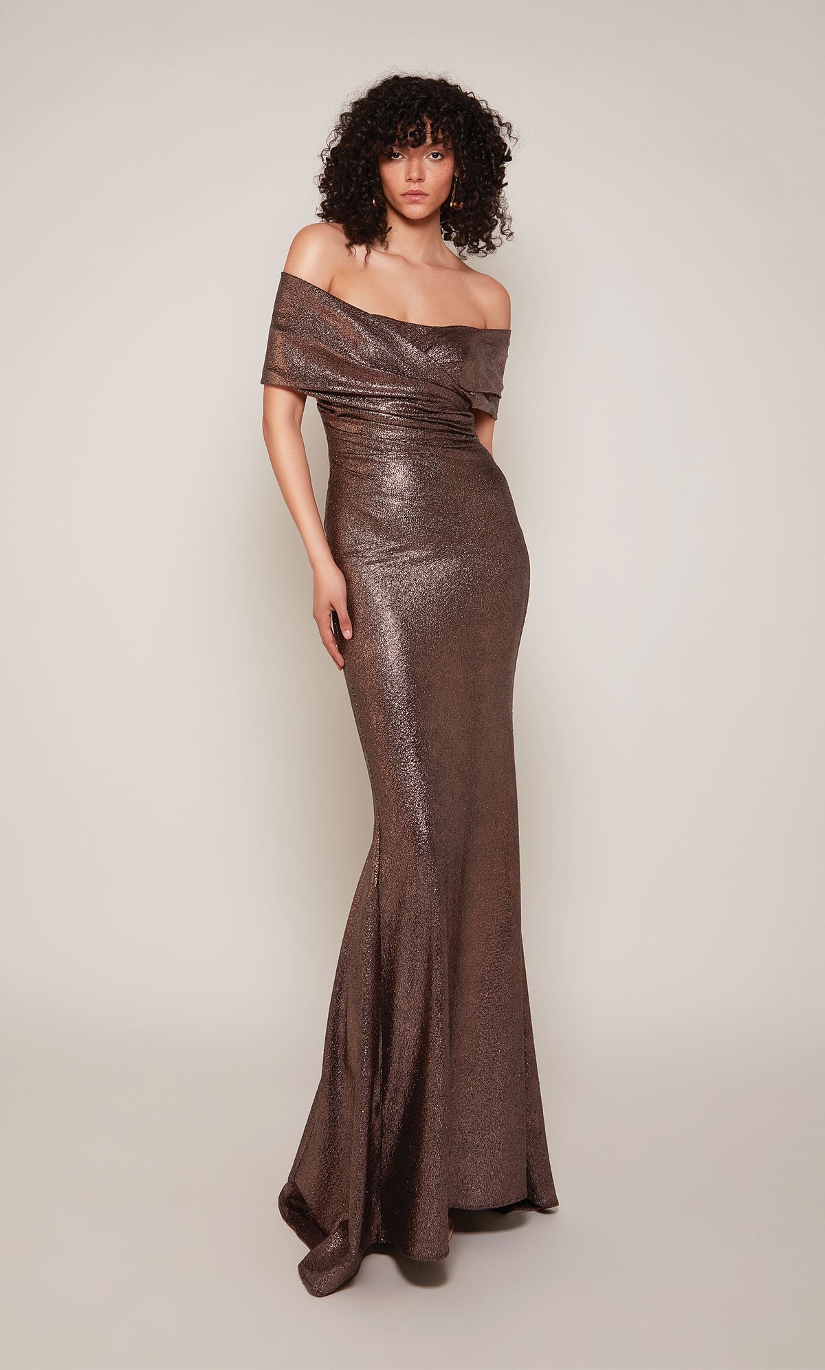 Off the shoulder draped formal dress with a fit and flare silhouette in a metallic cocoa color.