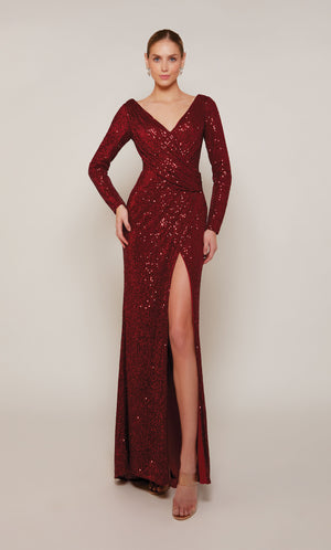 A long sleeve designer gown with a V-neckline, draped bodice, and side slit crafted from a rich wine colored sequin fabric.