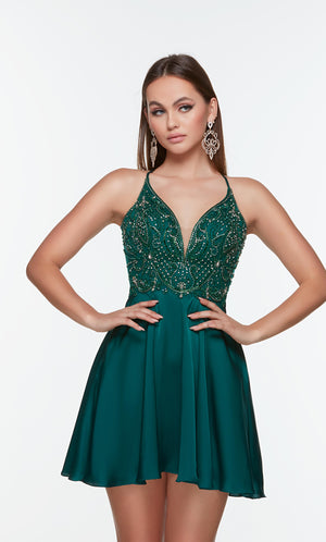 Green short dress with a plunging neckline and beaded bodice.