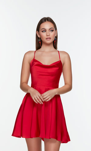 Short satin dress with a cowl neckline and pockets in red.