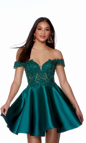 A Mikado flare party dress with an off-the-shoulder neckline and sheer corset bodice adorned with floral lace appliques in the color pine green.