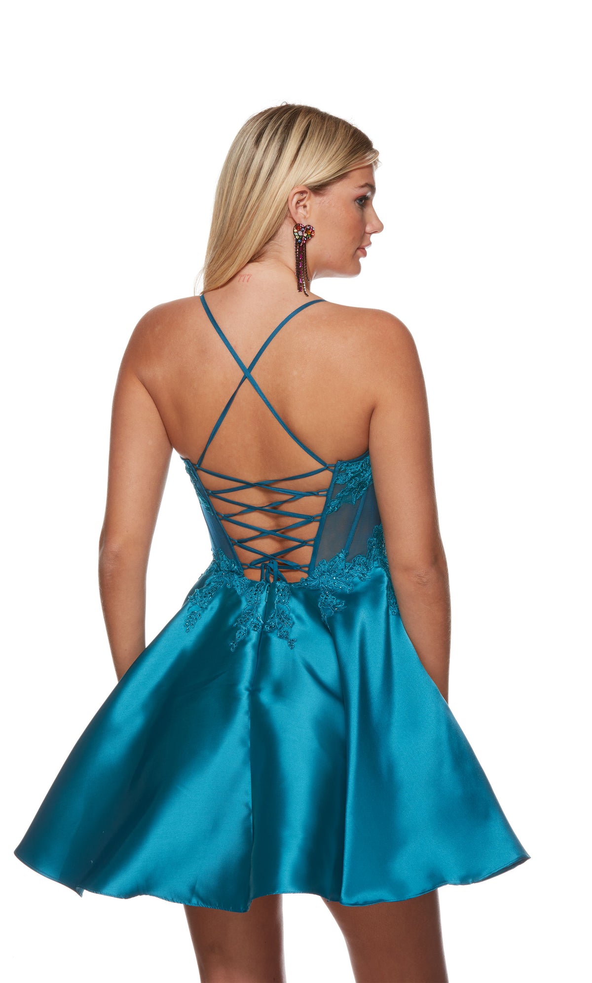 A teal blue, strappy lace up back corset dress with a sheer lace bodice and a flared A-line skirt.