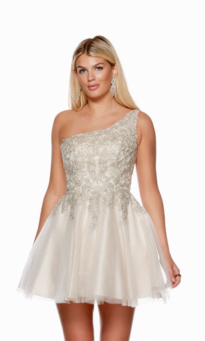 An ivory-champagne colored, one-shoulder short formal dress with a delicate lace bodice and a full tulle skirt.