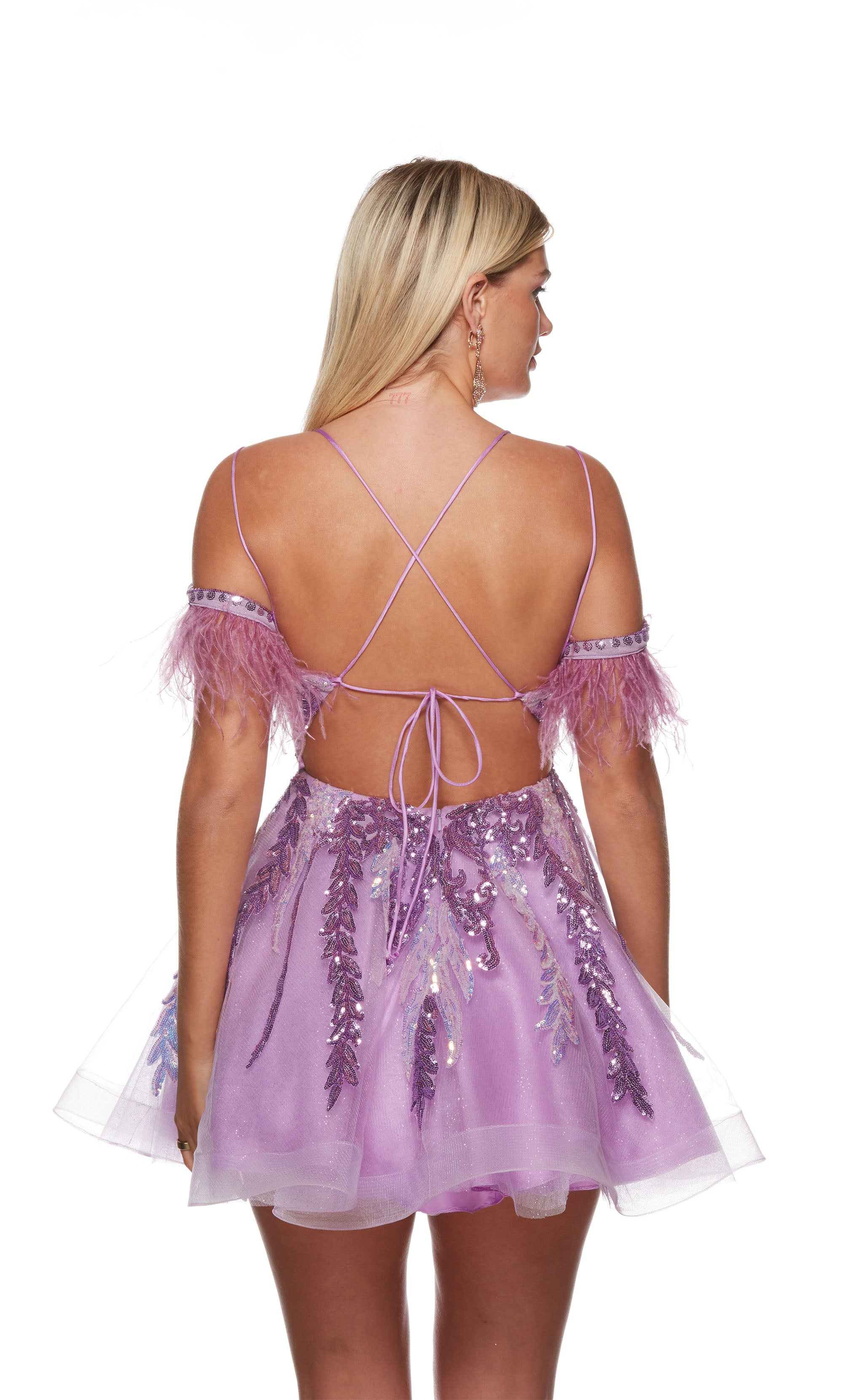 A fun and flouncy A-line dress with a plunging neckline, adorned with feather trim and multi-colored sequins for a touch of sparkle. The color is a vibrant lilac purple.
