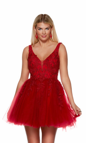 A red, V-neck short formal dress with floral appliques and a fitted waistline. The skirt is made of layered tulle. Shop our latest collection of gorgeous designer dresses by ALYCE Paris.