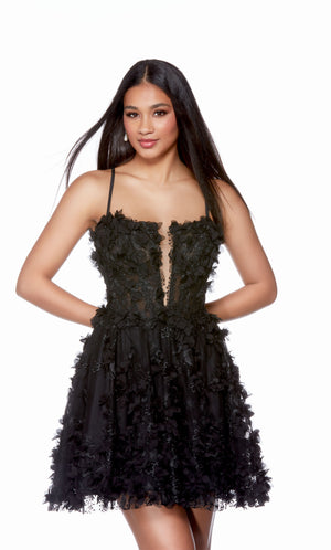 A whimsical yet edgy black corset dress with intricate 3D flower appliques throughout. The dress features a plunging neckline, a lace-up back and a flared A-line skirt.