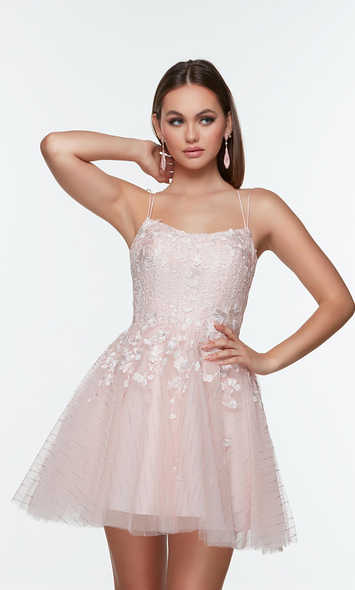 Light pink short party dress with a sweetheart neckline, floral lace appliques, and pockets.