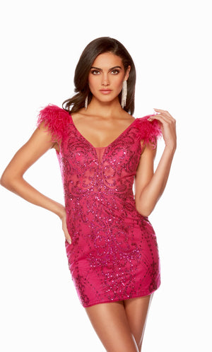 A vibrant pink homecoming dress with a plunging neckline, sheer bodice, and feather-accented sleeves.