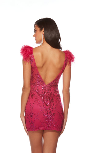 A vibrant pink homecoming dress with a v-shaped open back, sheer bodice, and feather-accented sleeves.