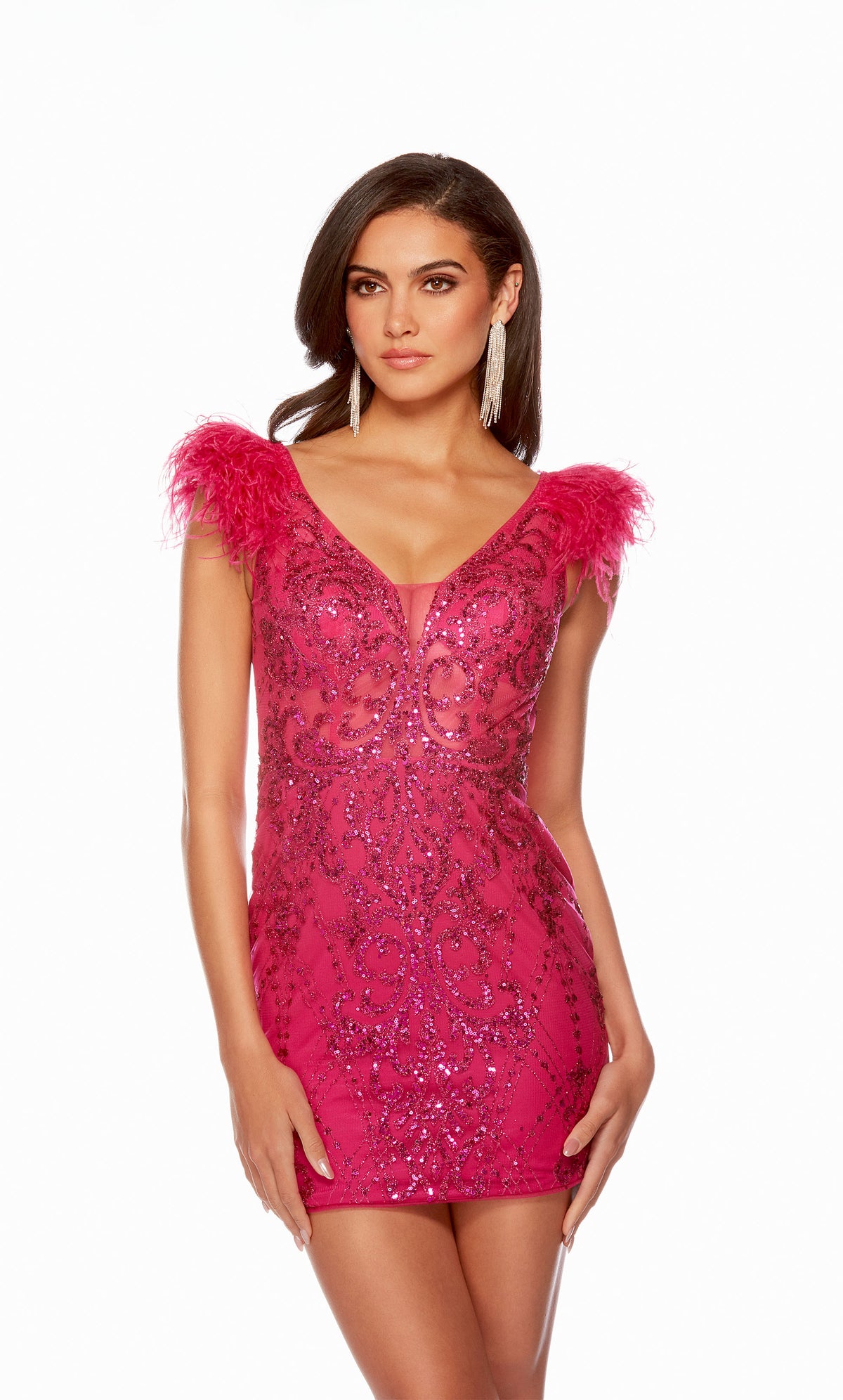A vibrant pink homecoming dress with a plunging neckline, sheer bodice, and feather-accented sleeves.