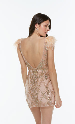 Gold sequin mini dress with a v shaped back and feathers.