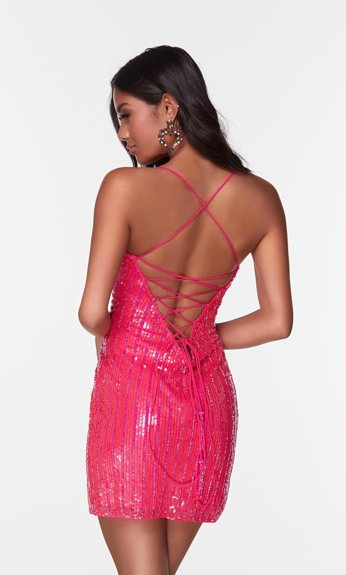 Short hot pink beaded mini dress with a strappy, lace-up back.