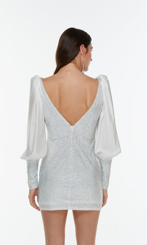 Puff sleeve sweetheart neck sparkly mini dress in white.