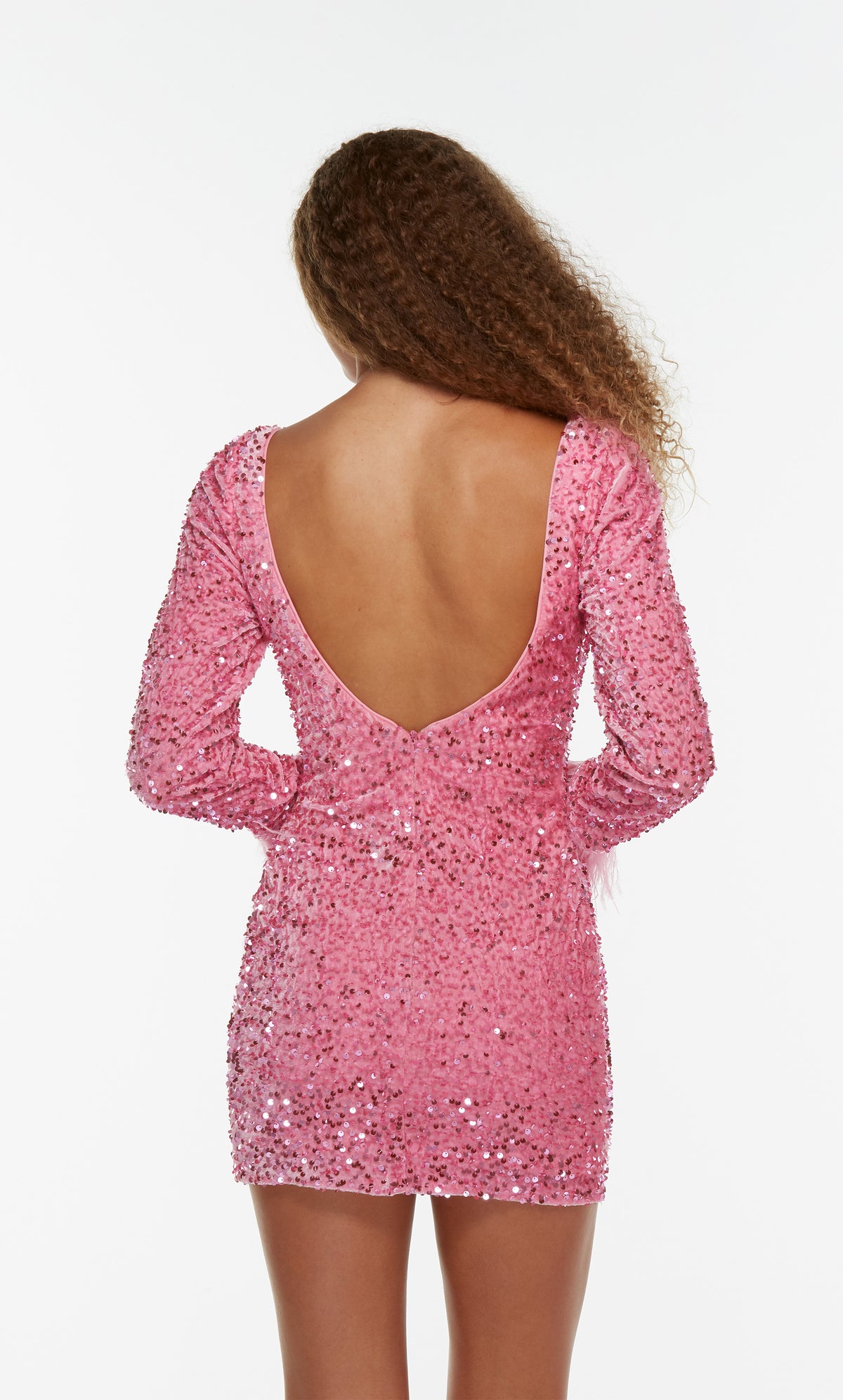 Pink sequin mini dress with feather trimmed long sleeves and a sexy open back.
