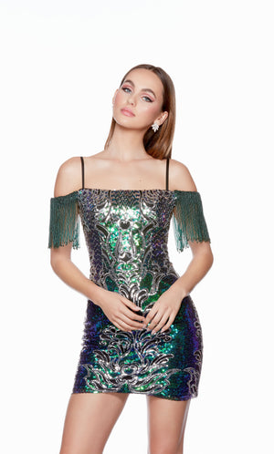 A glamorous sequined mini dress with an intricate design and a fringed, off-the-shoulder neckline. This dress is from our latest collection of gorgeous designer dresses by ALYCE Paris.