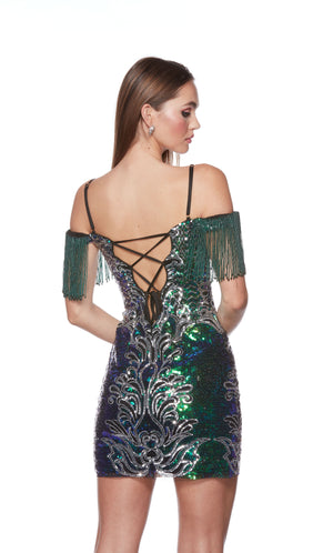A glamorous sequined mini dress with an intricate design and a fringed, off-the-shoulder neckline. The lace-up back makes for the perfect custom fit.