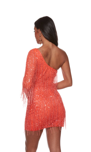 A stunning hand-beaded short fringe dress with a one-shoulder neckline and fringed long sleeve in the color hot coral.