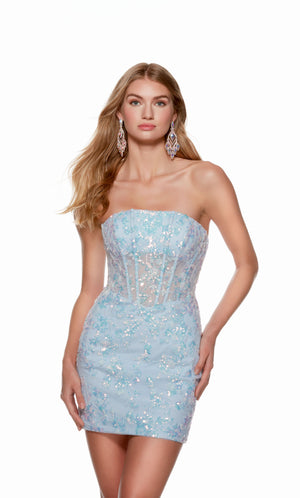 An ice blue, strapless corset dress with a sheer bodice and floral sequin detail.