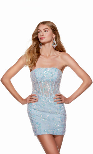 An ice blue, strapless corset dress with a sheer bodice and floral sequin detail.