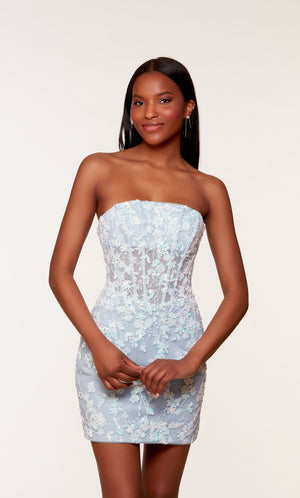 An opal-ice blue, strapless corset dress with a sheer bodice and floral sequin detail.