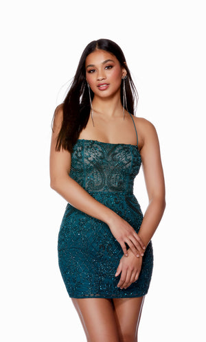 A dragonfly blue, short formal dress highlighting stunning hand-beaded detail and a refreshing straight across neckline with thin spaghetti straps.