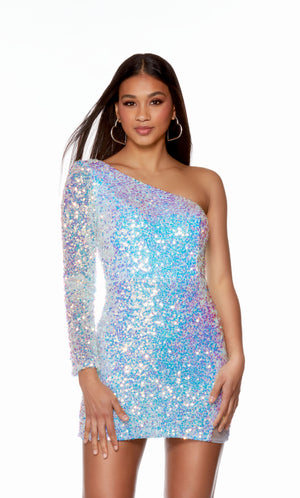 A glamorous, one-shoulder, iridescent sequin short designer dress with a zip-up back and fitted silhouette in the color light blue. The dress has a mesh illusion slit on the left side that adds a bit of fun to the finished look.