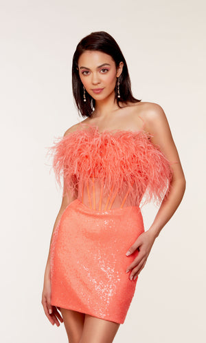 A chic, feather dress with a strapless corset bodice and fitted sequin skirt in hot coral.