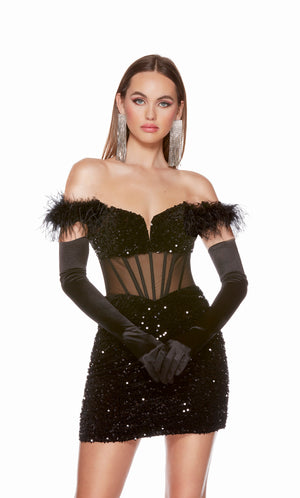 A glamorous, off-the-shoulder, sequin cocktail dress with feather trim, a sheer corset top, and a fitted silhouette in black. The dress was accessorized with long black satin gloves which are not included with dress purchase.