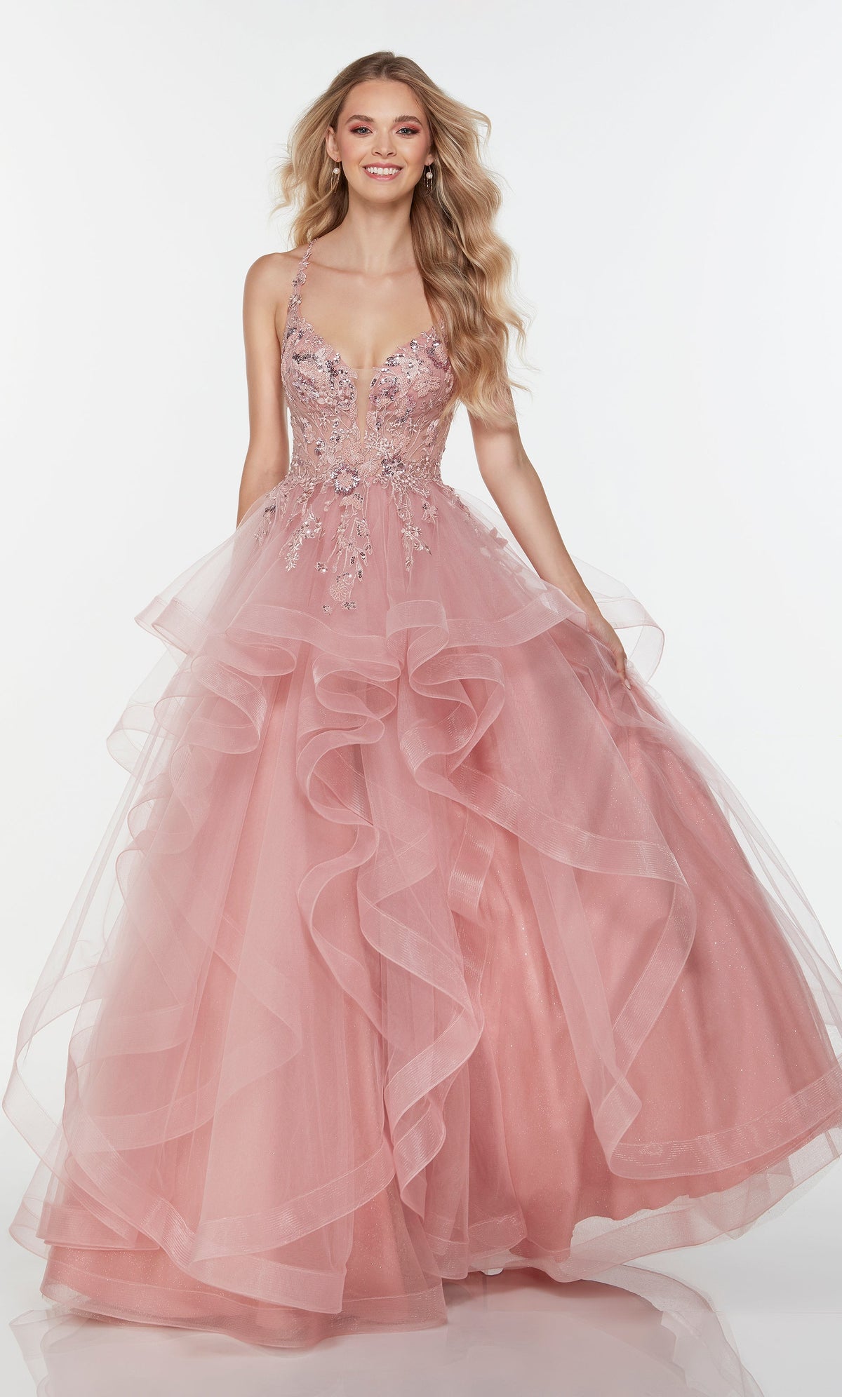 Layered tulle dress with a plunging neckline, sheer bodice, and lace appliques in pink.