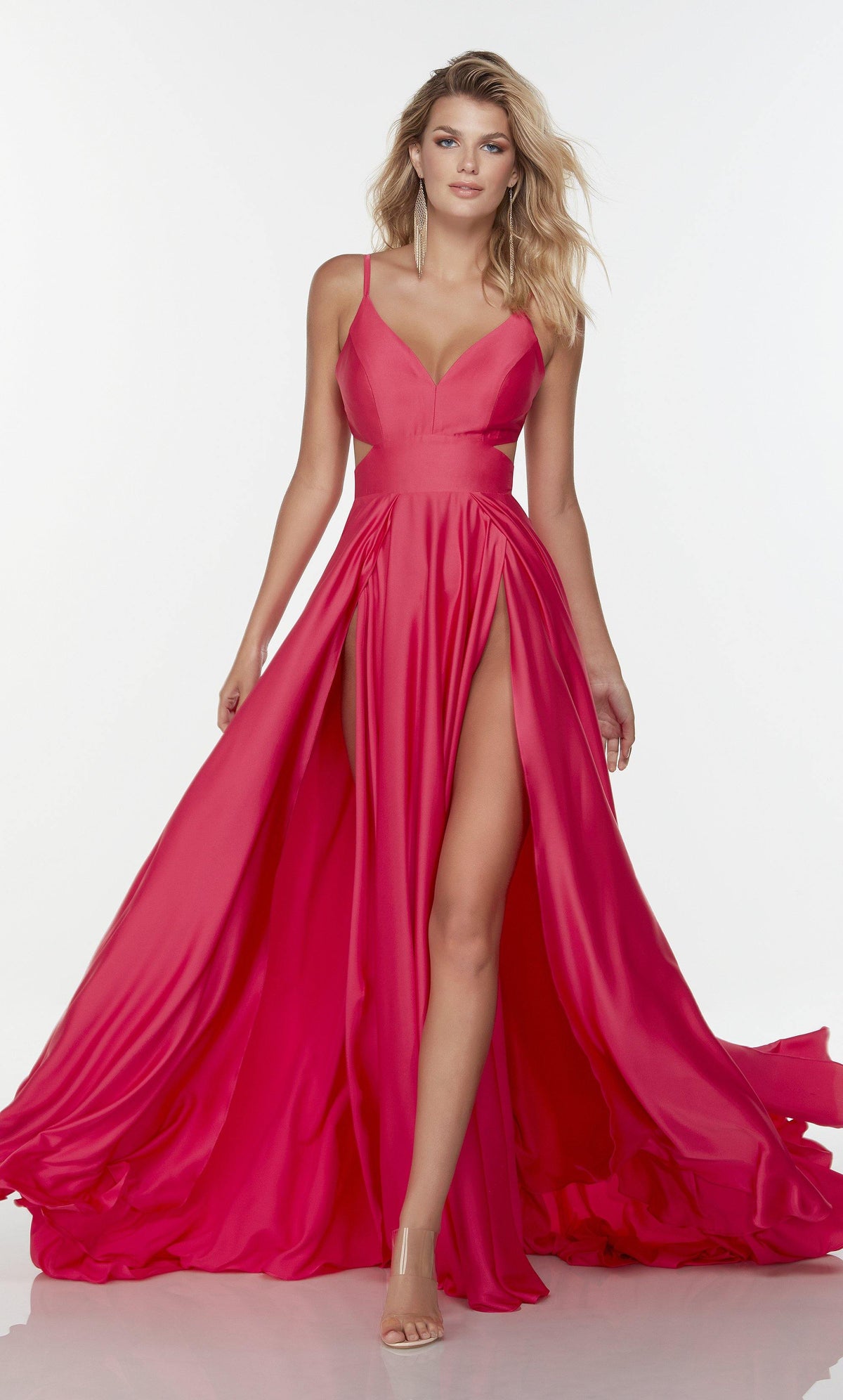 Long hot pink double slit dress with a v neck and side cut outs.
