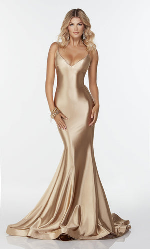 Long gold dress with a v neck; designed in a fit and flare silhouette.