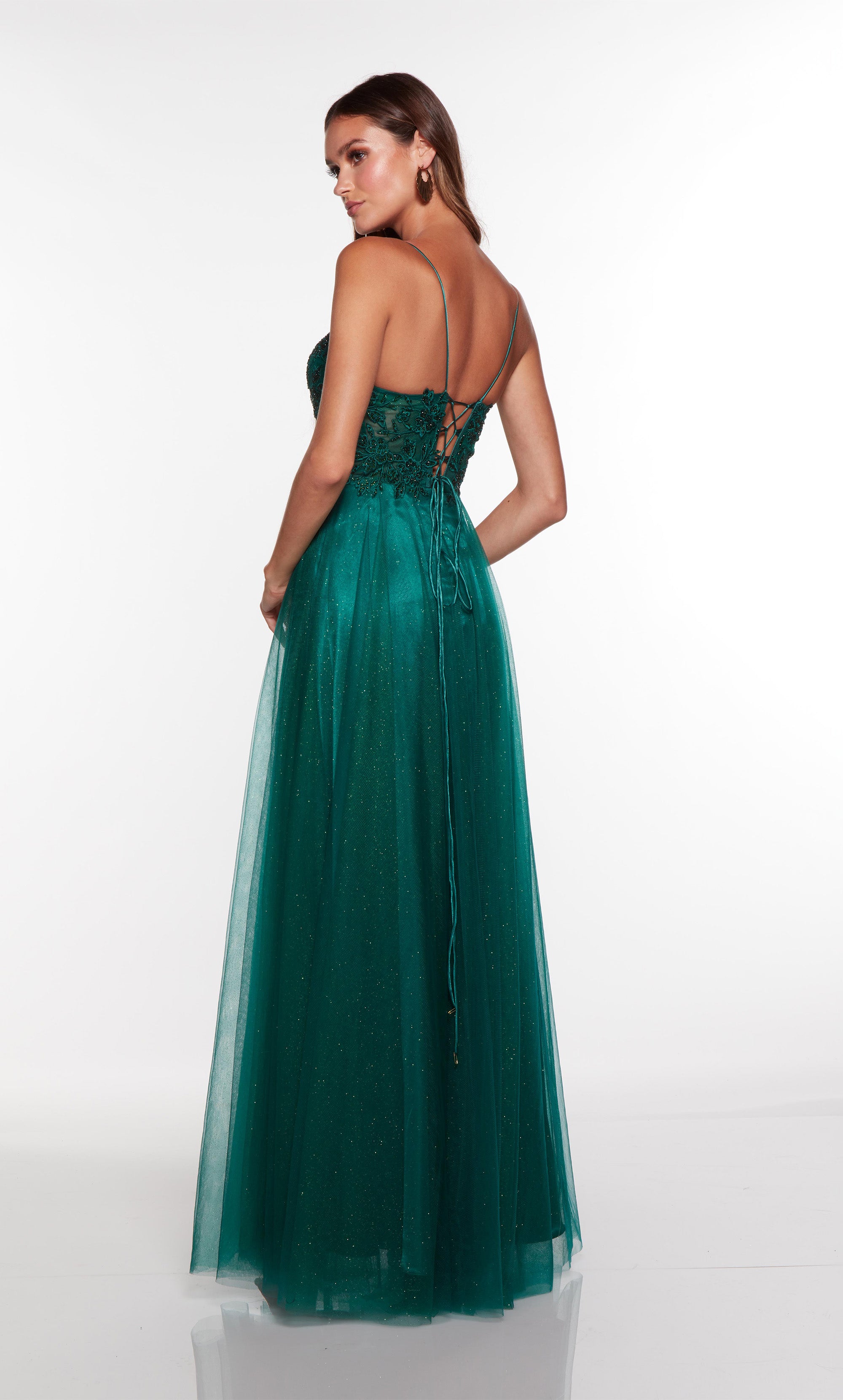 A line green prom dress with a sheer lace corset bodice and front slit. COLOR-SWATCH_61325__PINE