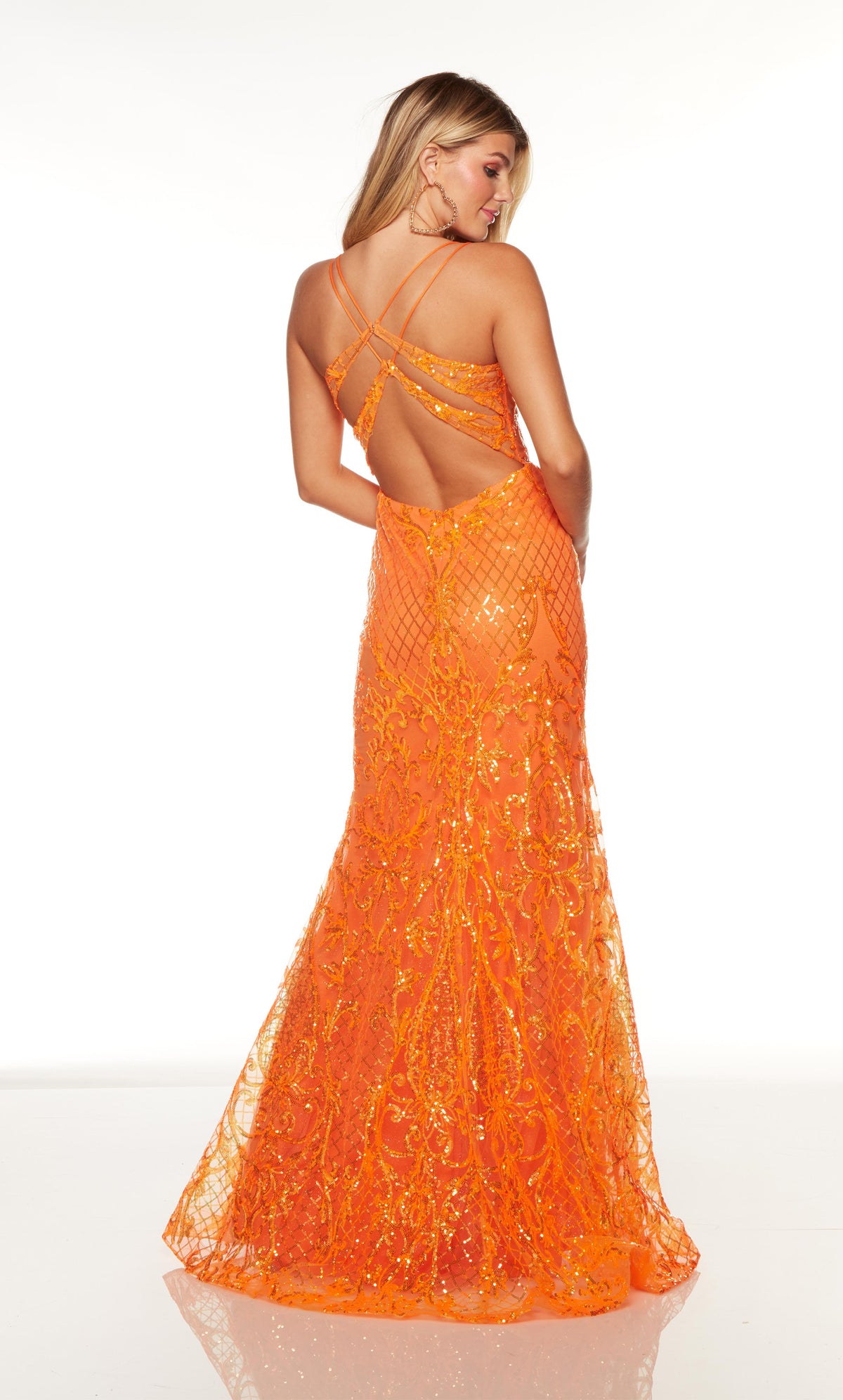 Sparkly fit and flare orange prom dress with a strappy open back.