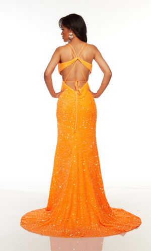 Sparkly prom dress with a strappy back, side slit, and train in orange sequins.
