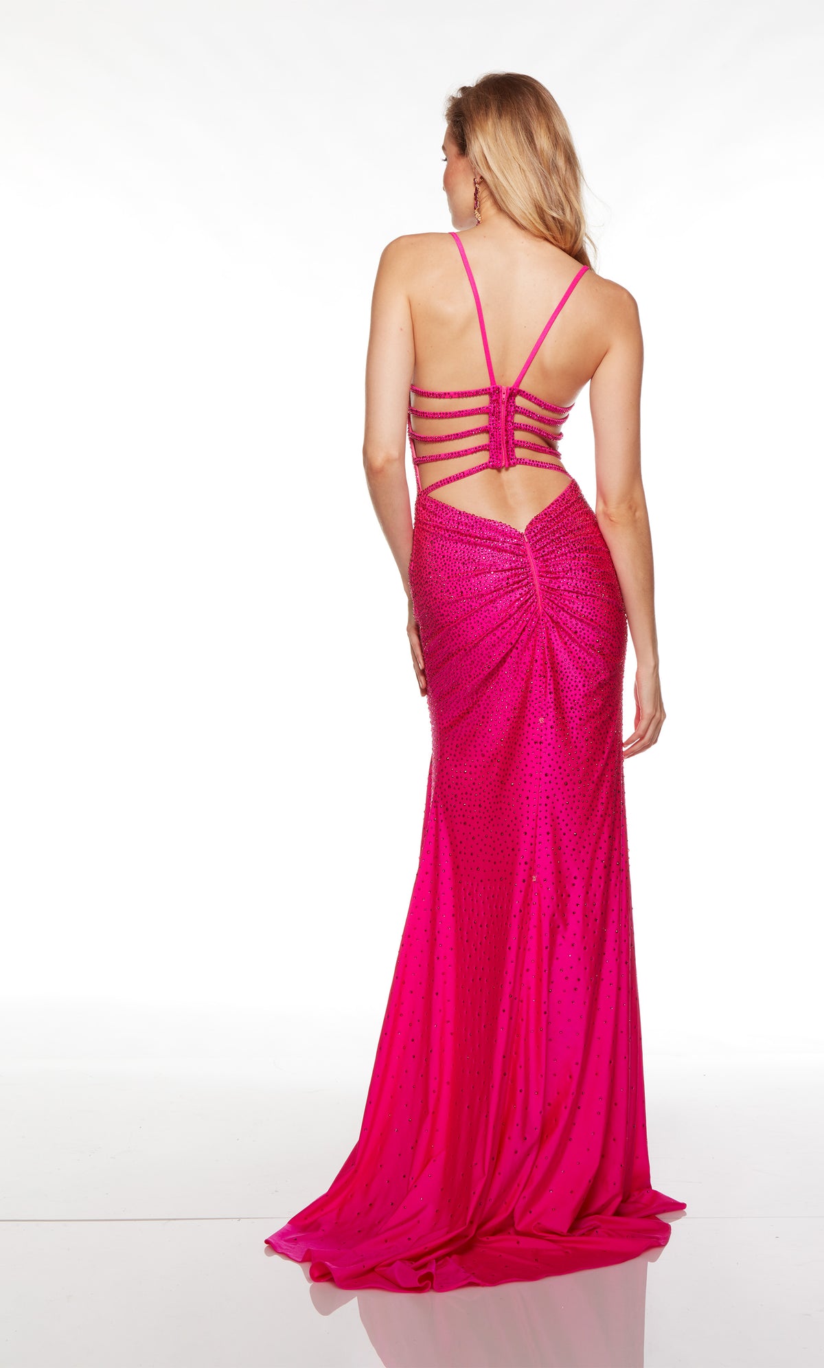 Long sparkly electric fuchsia dress with a straight neckline and side slit.
