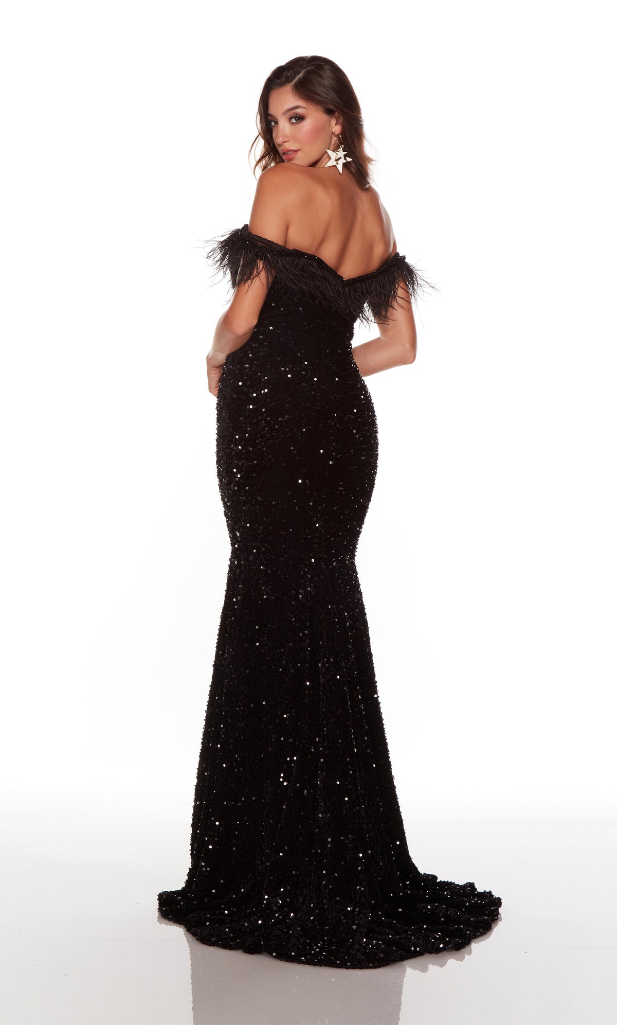 Black off the shoulder evening gown with feather trim, a zip up back, and train.