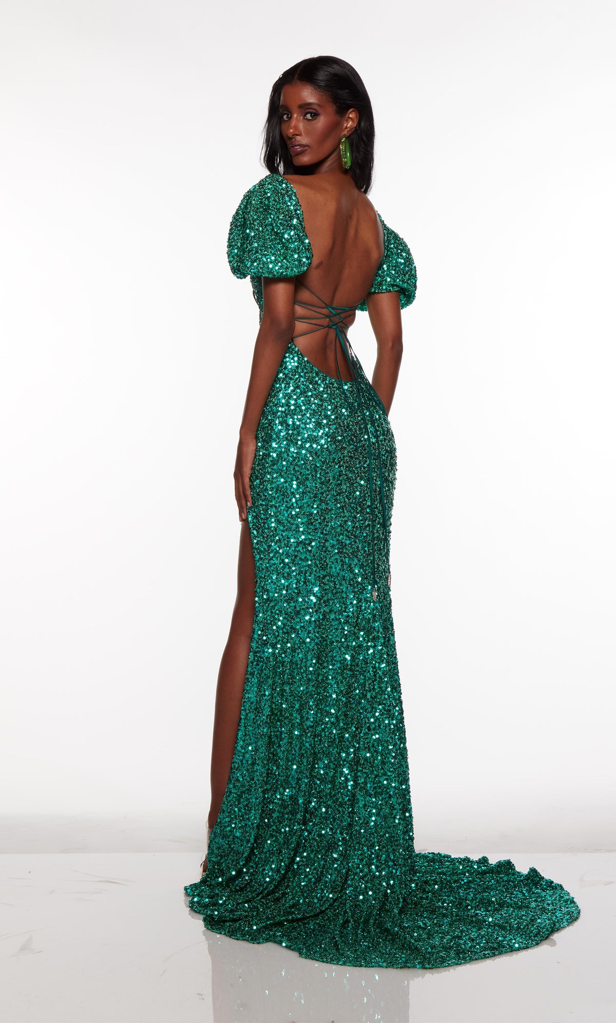 Puff sleeved formal dress with high side slit in green sequins.