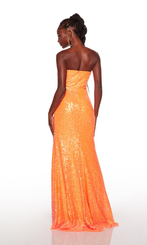 Strapless sequin gown with a zip up back and train in neon orange.