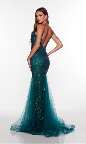 Sparkly open back prom dress with train in dark green.